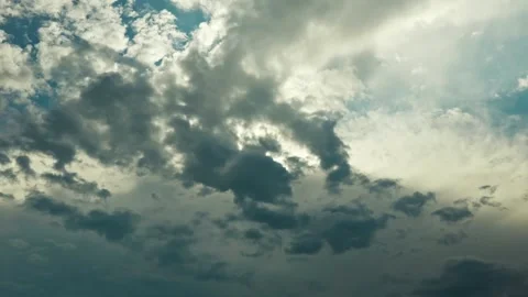 Dramatic stormy clouds in blue sky background 2 Stock Footage 339779705