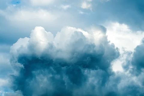 Dramatic stormy clouds high up in the sky as weather and climate background Stock Photos