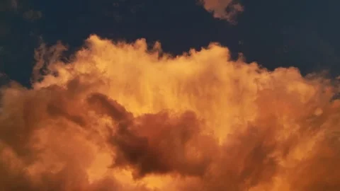 Dramatic stormy clouds illuminated by the sunset Video stock 336946613