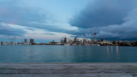 Dramatic stormy clouds moving towards Auckland City Stock Footage 130037137