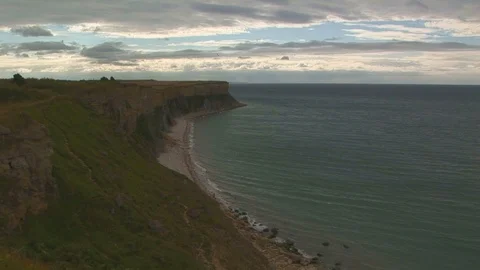 Dramatic stormy clouds over cliff line Normandy, France Stock Footage 101207310