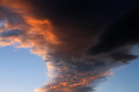 Dramatic stormy clouds at sunset Stock Photos