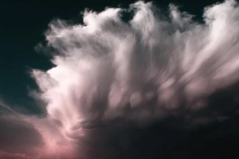 Dramatic stormy clouds at sunset Stock Photos