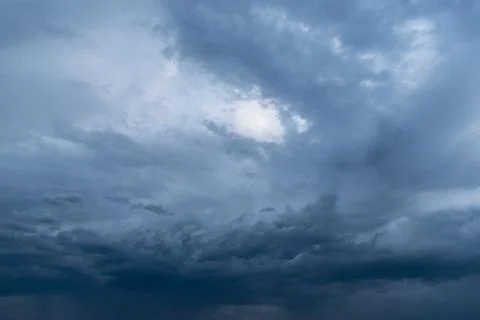 Dramatic stormy dark cloudy sky, natural photo background Stock Photos