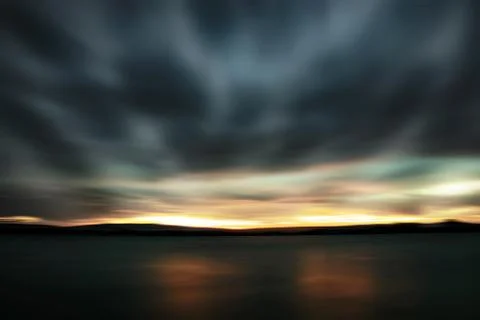 Dramatic stormy dark cloudy sky, natural photo background Stock Photos