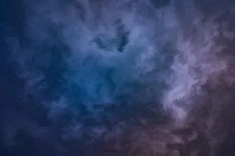 Dramatic stormy dark cloudy sky, natural photo background Stock Photos