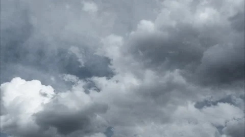Dramatic stormy sky and fast moving clouds timelapse. 4k resolution video. Puffy Video stock 186401694