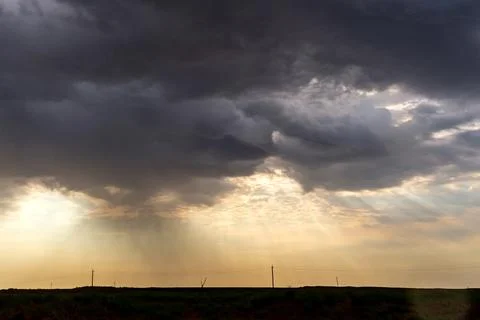 Dramatic stormy sky in desert before thunderstorm Stock Photos