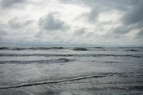 A Dramatic Stormy Sky Over the Ocean Stock Photos
