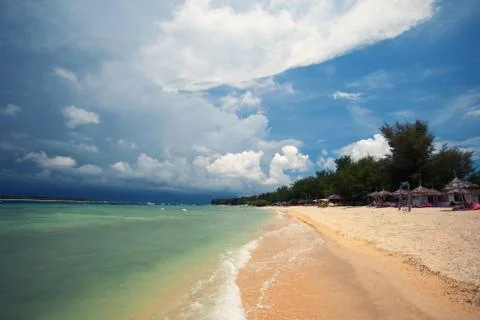Dramatic stormy sky over tropical beach Stock Photos