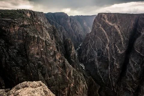 Dramatic Stormy Sunset on the Painted Wall, Black Canyon of the Gunnison Foto stock