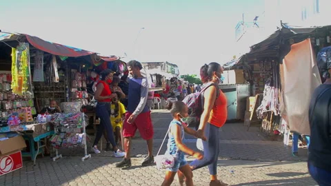 Dramatic street video in downtown district of the Haitian market in dominican re Stock Footage 145696333