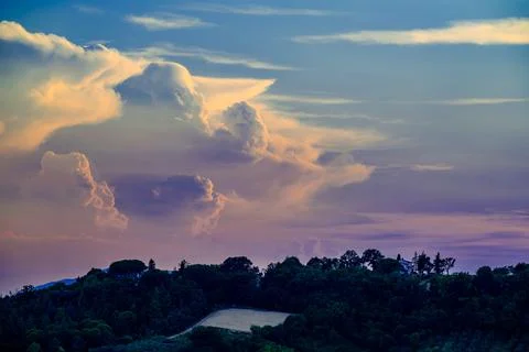 Dramatic summer clouds over Marche Romagna border near Mondaino Stock Photos