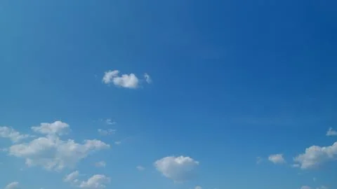 Dramatic summer cloudscape. Blue sky white clouds. Changing cloudscape 写真素材