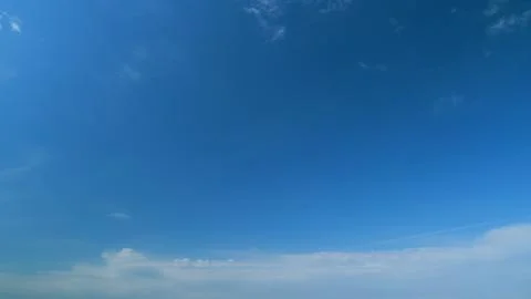 Dramatic summer cloudscape. Blue sky white clouds. Changing cloudscape 写真素材