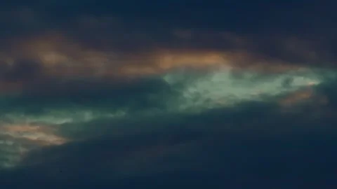 A dramatic summer evening sky in blue and orange tones Stock Footage 321694418