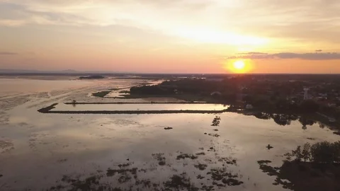 Dramatic summer sunset over Nong Han lake, Sakon Nakhon, Thailand. Stock Footage 90680069