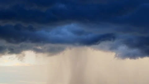 Dramatic summer thunderstorm rain at sunset Stock-Footage 336257406