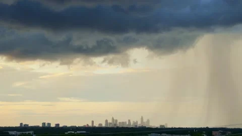 Dramatic summer thunderstorm rain at sunset over the Charlotte, NC Stock Footage 336257457