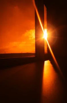 Dramatic sun flare through office window background Foto stock