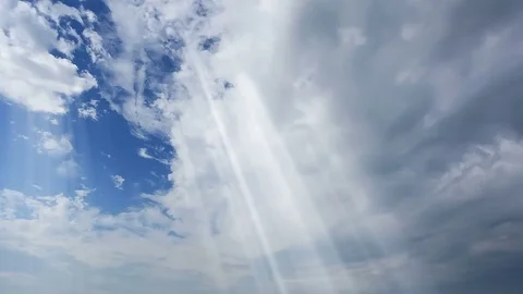 Dramatic sun rays and clouds as looping ... | Stock Video | Pond5