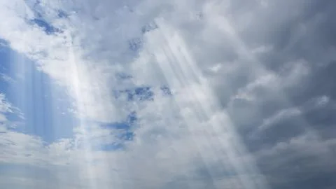 Dramatic sun rays and clouds as background Stock Photos