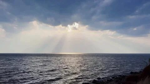Dramatic Sun Rays Breaking Through Clouds Over Erhai Lake, Dali, Yunnan Stock Footage 337345303