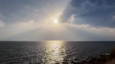 Dramatic Sun Rays Breaking Through Clouds Over Erhai Lake at Sunset, Dali, Stock Footage 337345387