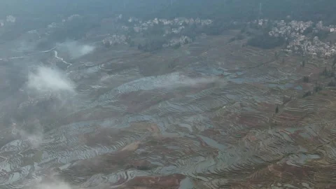Dramatic Sun Rays Over Mountain Terraces in Yuanyang, China Stock Footage 344038421