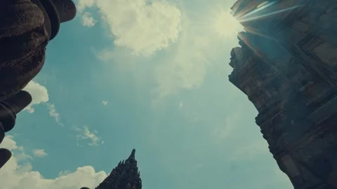 Dramatic Sun Star Bursting Over Temple Towers Silhouette Stock Footage 333325829