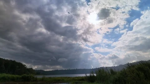 Dramatic Sunbeams Over Lake Buyan in Bali Stock Footage 339460434