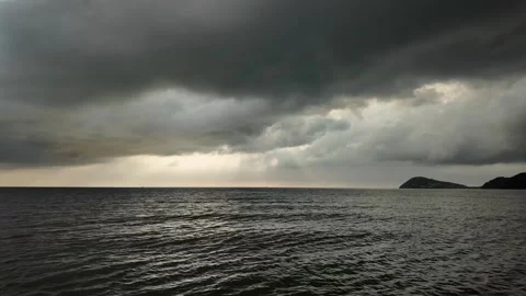 Dramatic Sunbeams Over Stormy Seascape Stock Footage 264810924