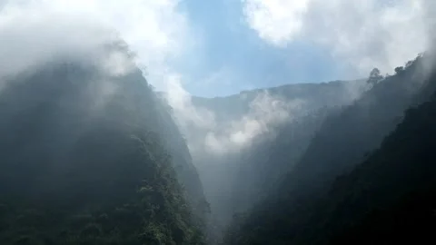 Dramatic sunlight on a steep mountain slope Stock Footage 280378518
