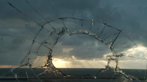 Dramatic sunlight trough broken glass window Vídeo Stock 37164801