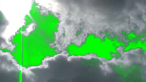Dramatic Sunlit Clouds Moving Across Green Screen Chroma Key Stock Footage 340676116