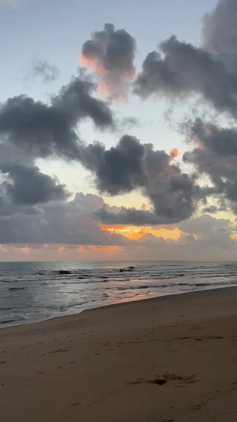 Dramatic sunrise clouds over a tropical beach in Malaysia Stock Footage 328132425