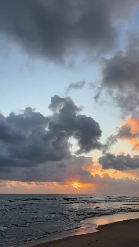Dramatic sunrise clouds over tropical beach, Marang, Malaysia Stock Footage 328132439