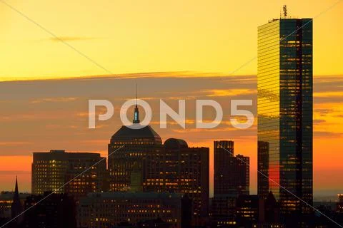 Dramatic sunrise over boston downtown Stock Photos