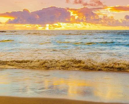 Dramatic Sunrise Over Breaking Waves on Homoa Beach, Hana, Maui, Hawaii, USA Stock Photos