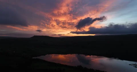 Dramatic sunrise over the hills and lake Stock Footage 272708926