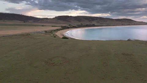 Dramatic Sunrise Over Kelvedon Beach, Tasmania After Night Storm – Drone 4K Stockbeeldmateriaal 311570368