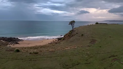 Dramatic Sunrise Over Kelvedon Beach, Tasmania After Night Storm – Drone 4K Stock Footage 311570375