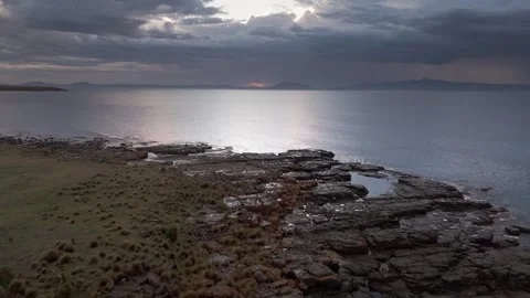 Dramatic Sunrise Over Kelvedon Beach, Tasmania After Night Storm – Drone 4K Stock Footage 311570402