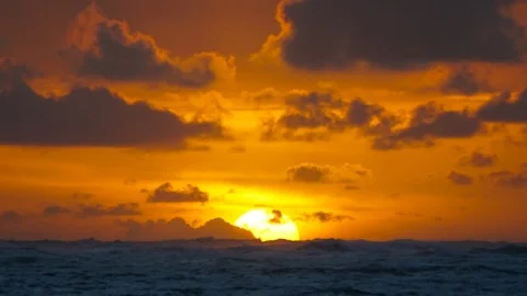 Dramatic sunrise over ocean waves. Clouds Stock Footage 85213237