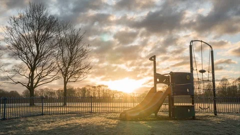 Dramatic Sunrise at the playground. Time Lapse Stock Footage 87191346