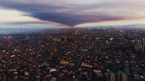 Dramatic Sunrise Sky Over Metro Manila with Expanding Cloud Formation Stock Footage 328498638