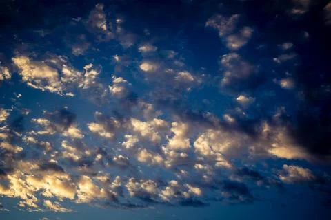 Dramatic sunrise sky with vibrant cloud cover over rural Andalusian country.. Stock Photos