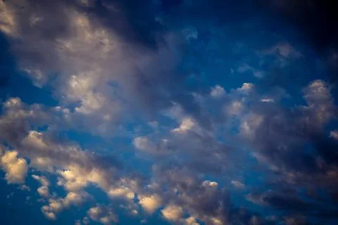 Dramatic sunrise sky with vibrant cloud cover over rural Andalusian country.. Stock Photos