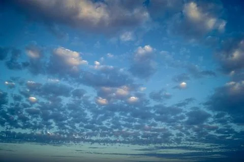 Dramatic sunrise sky with vibrant cloud cover over rural Andalusian country.. Stock Photos