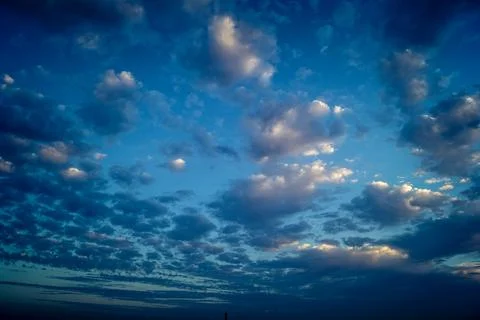 Dramatic sunrise sky with vibrant cloud cover over rural Andalusian country.. Stock Photos